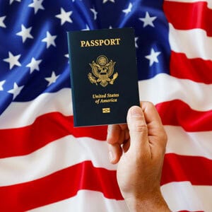 USA Passport and Flag - Driggs Immigration Law.